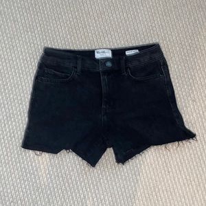 Black denim shorts